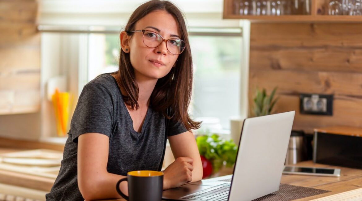Female web designer working in home office